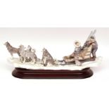 Large Lladro group "Onward", modelled as a dog sled with Inuit children, dogs and pup, signed by