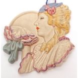 Clarice Cliff wall pocket, moulded and painted in the form a lady in art deco costume, blue