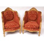 Pair of Louis Quinze style gilt and gesso framed armchairs, reupholstered in traditional designer