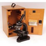 Mid-20th century cased monocular microscope, Ernst Leitz Wetzlar 503897, the integral stand and base