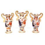 Garniture of three 19th century English Ironstone two-handled vases, of baluster form and brightly