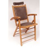 An unusual 20th century fruitwood or pine examination/dentist chair, leather or leatherette