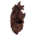 Late 19th/early 20th century Bavarian carved oak wall pocket formed as hanging game birds and powder