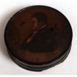 Early 19th century black lacquer papier m ch tobacco box of circular form with pull off cover and