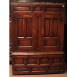 18th century oak housekeeper's cupboard, the upper section with two doors with fielded panels and