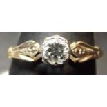 Precious metal single stone diamond ring, the bezel set brilliant cut diamond (0.25ct app) in a high