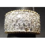 Modern 18ct gold and diamond cluster ring, the band set with 69 small single cut diamonds, (1.5ct