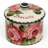 Wemyss circular lidded biscuit box, decorated with cabbage rose design on a white ground in the