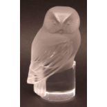 Lalique small paperweight, modelled as a frosted glass owl on an integral circular clear base,