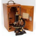 Early 20th century German lacquered brass and black patinated monocular microscope, E Leitz -