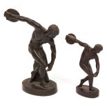 Two patinated bronze figures of discus throwers, 5 1/2" and 4" high (2)