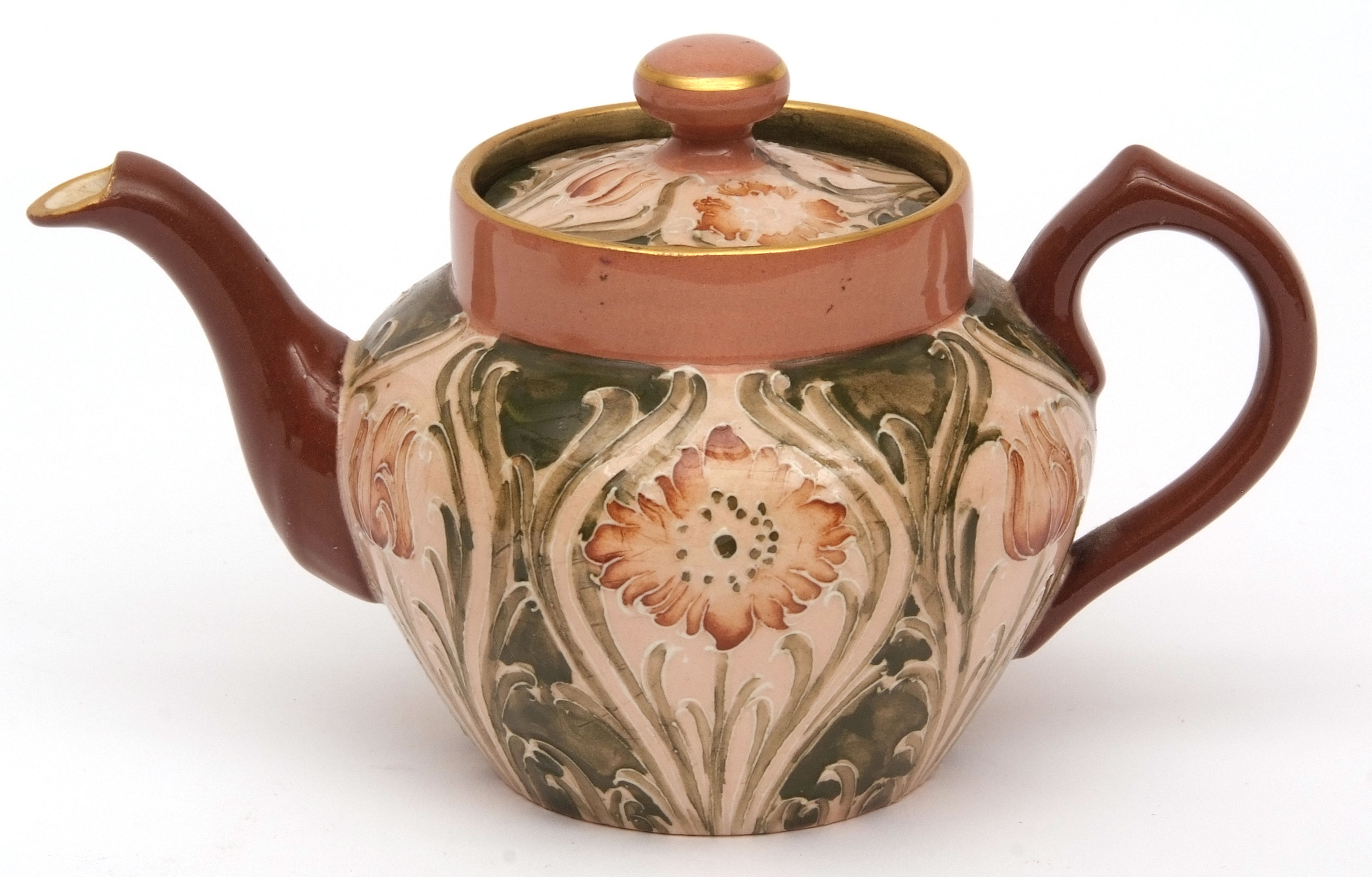 Macintyre teapot of tapering baluster form, decorated with a florian design in shades of brown and