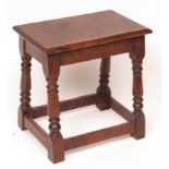 18th century and later oak coffin stool, plain top with moulded edge over four ring turned splayed