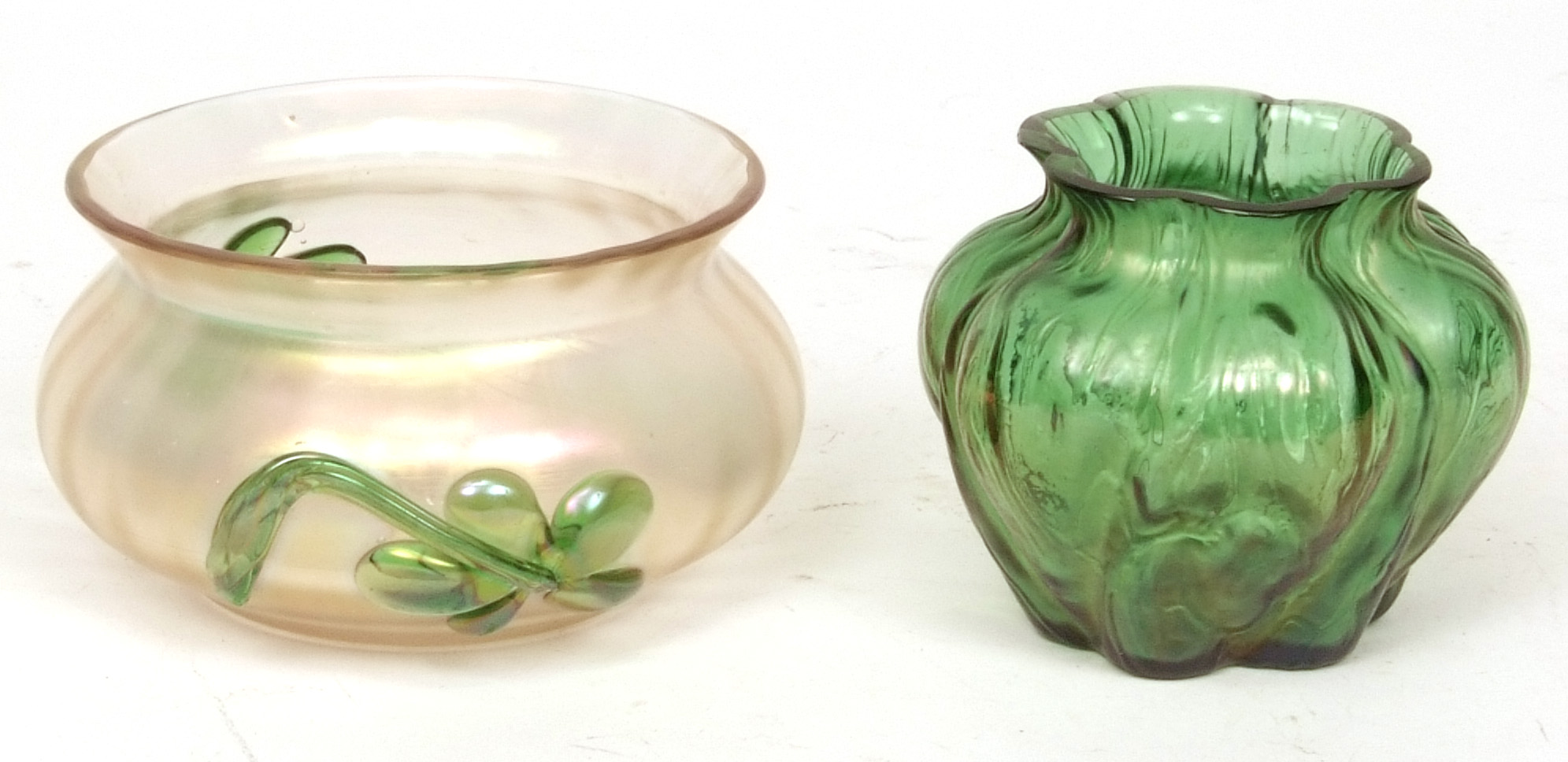 Decorative small green tinted studio glass baluster vase of lobed form, possibly Loetz, together