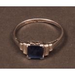 Art Deco sapphire and diamond ring, the centre a square cut sapphire, (5mm), set either side with