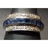 Mid-20th century 18ct white gold, sapphire and diamond ring, having centre row of 12 square