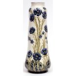 Moorcroft Florian Ware large baluster vase of spreading form, decorated with a poppy design, green