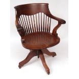 Late 19th/early 20th century mahogany swivelling office chair with bar back over plain spindles