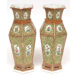 Pair of Chinese Canton porcelain vases of hexagonal form decorated with small panels of floral