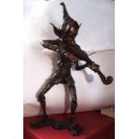 Bronze patinated metal study of a mythological goblin playing a fiddle or violin, modern, 39" high