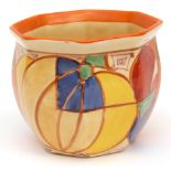 Clarice Cliff octagonal pot of slightly tapering form, decorated with the Melon (Picasso Fruit)