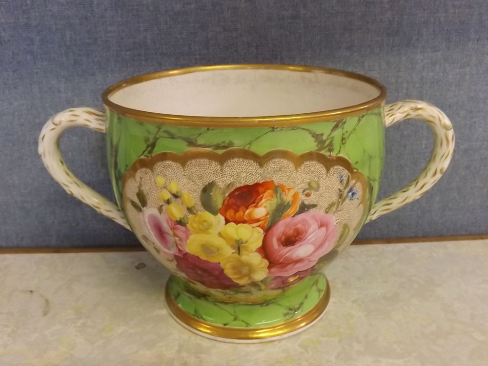 19th century English large double-handled cup or vase, decorated with floral panels and gilt