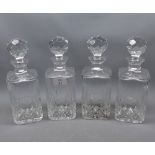 Set of four octagonal decanters with star cut bases