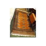 20th century Middle Eastern floor runner carpet decorated with central panel of lozenges on an