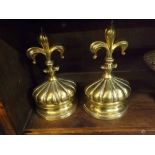 Pair of 19th century copper and weighted door stops of fleur de lys form