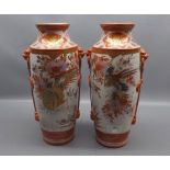Pair of early 20th century Japanese Kutani double-handled cylindrical vases, decorated with golden