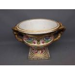 Large 19th century Derby double handled urn, decorated with floral and gilt detail, raised on a