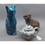 Mixed lot of Oriental wares: blue glazed cat, 20th century composition temple dog and a further 19th