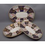 Three Bloor Derby oval meat plates, decorated with floral and gilt highlights, largest 16" wide