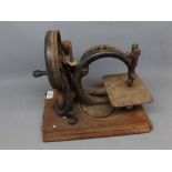 Vintage sewing machine on wooden plinth base, 12" long