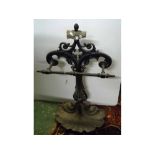 Victorian cast iron stick stand, with shell-formed base tray, 30" high