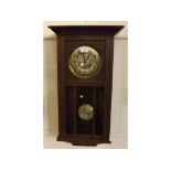 20th century oak cased wall clock with glazed front door