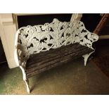 Cast aluminium and slatted wood garden bench with fern leaf decoration to sides and back,