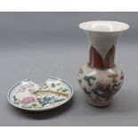 Oriental Baluster Vase decorated in colours with a dragon design, together with further Saucer