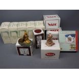 Boxed modern Wade collectables to include The Camelot collection, Gingerbread children, British