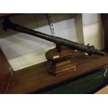 Malaysian or Indonesian small Lantaka cannon, 26" long, on related wooden plinth base