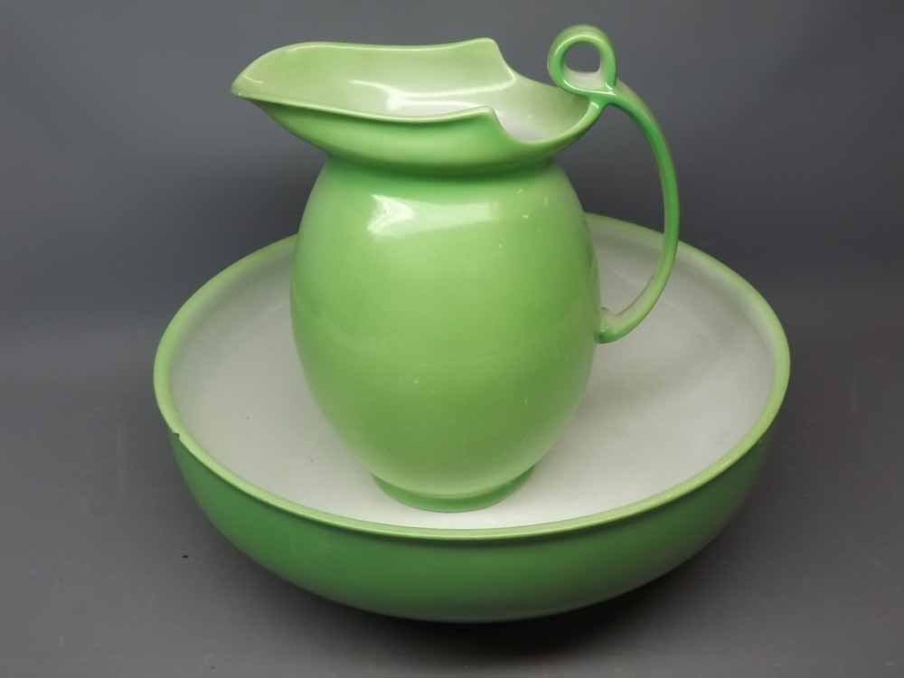 Royal Doulton green glazed wash bowl and jug, registered number 493808