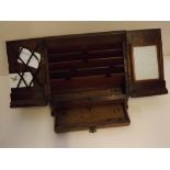 Late 19th century stained oak wedge-formed letter and stationery box, with double hinged doors and