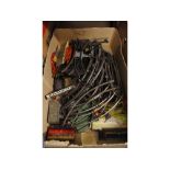 Box containing a quantity of metal 'O' gauge track and various accessories to include bridge,