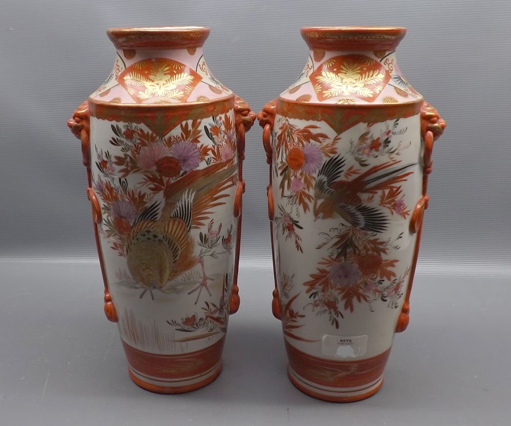 Pair of early 20th century Japanese Kutani double-handled cylindrical vases, decorated with golden