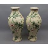 Eichwald, a pair of fuchsia decorated baluster vases, one with significant chip, 12" high