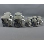 Collection of Royal Copenhagen Fajance mugs, four large and six small
