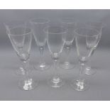 Set of seven tall clear glass wines
