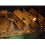 Ten assorted vintage wooden moulding planes