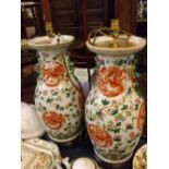 Large pair of reproduction Chinese vases, famille rose decoration with dragon medallions, formed