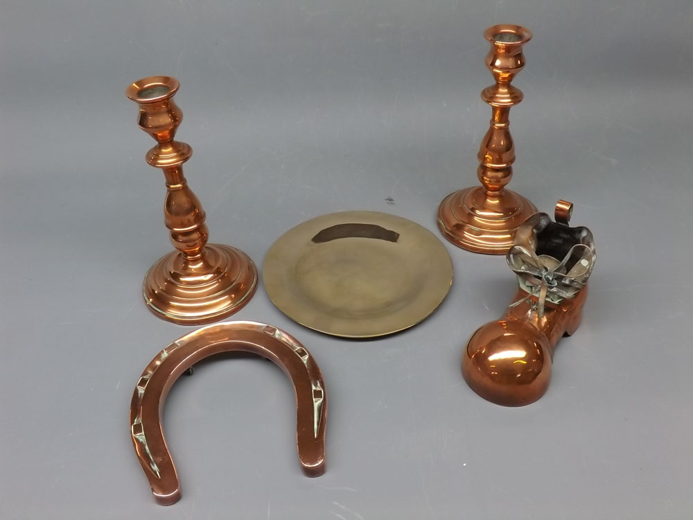 Pair of copper knopped columned 7" candlesticks, together with a further copper horseshoe